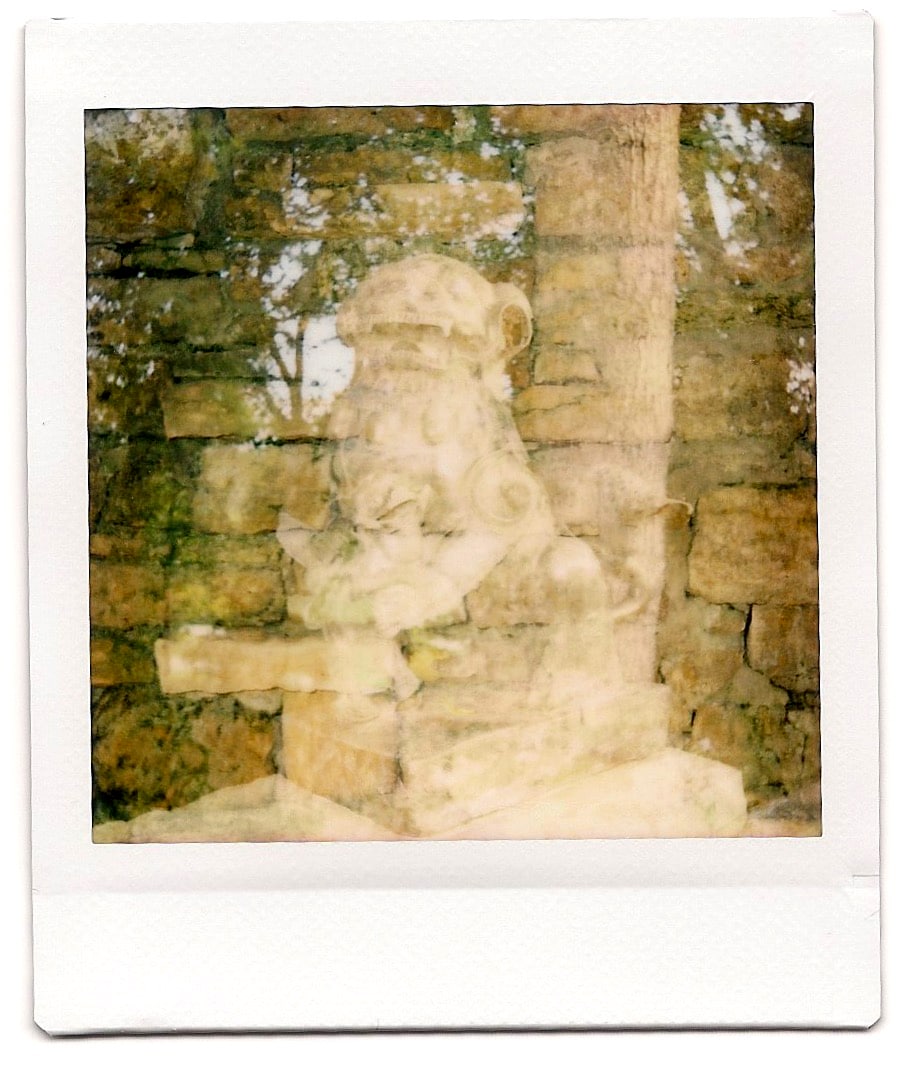 Double exposure of Chinese guardian lion and limestone at Taliesin