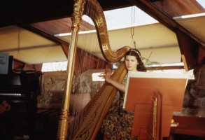 Iovanna Wright playing harp at Taliesin West.