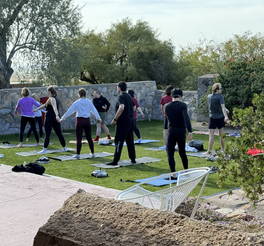 WSU students taking a yoga class at Taliesin West