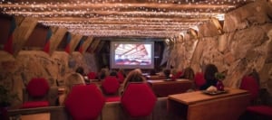 visitors enjoying a screening of a classic movie in the Cabaret Theater