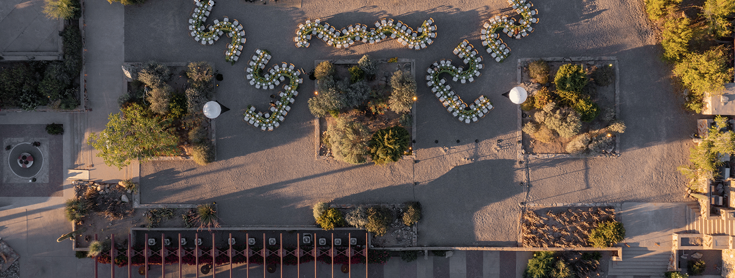 Overhead image of outdoor corporate reception at Taliesin West