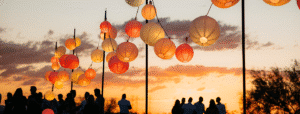 paper lanterns dancing against a sunset corporate event at Taliesin West